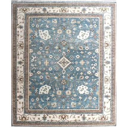 Hand-knotted blue Oushak wool rug with ivory border for luxury living room