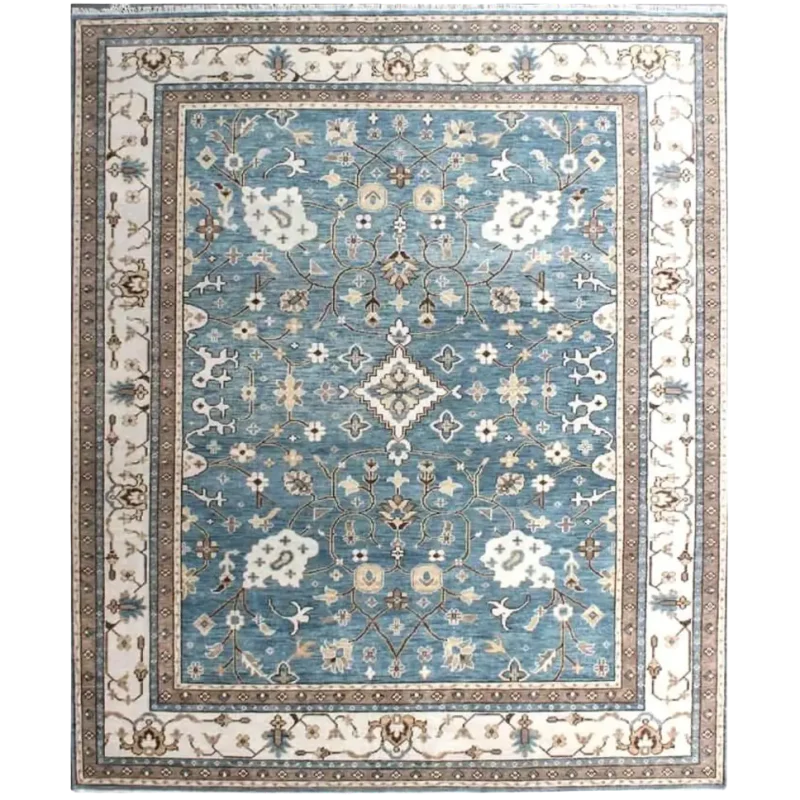Hand-knotted blue Oushak wool rug with ivory border for luxury living room