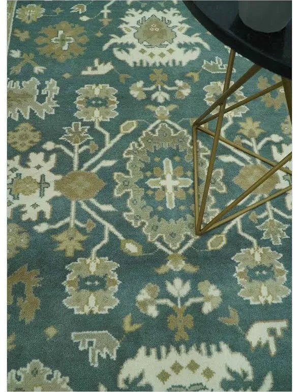 Full perspective view of a custom size traditional hand-knotted wool rug on a floor.
