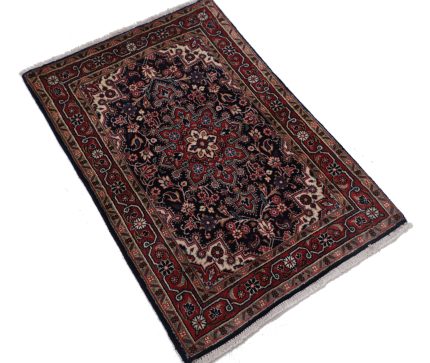 hand knotted antique rugs in interior setting