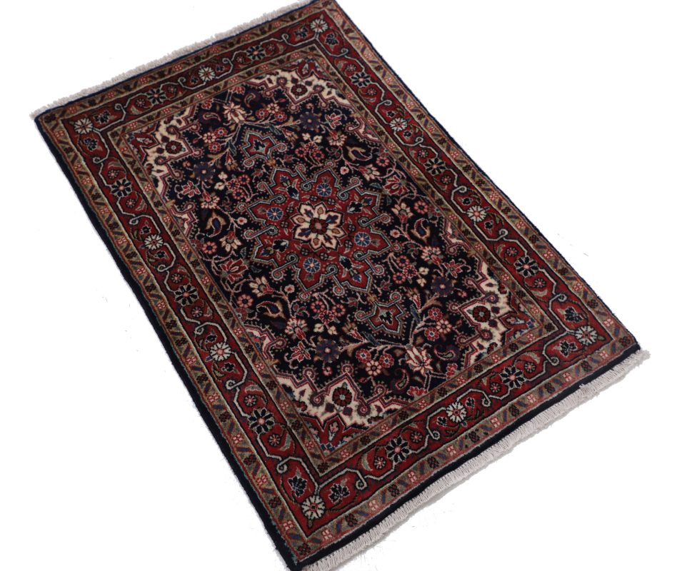 hand knotted antique rugs in interior setting