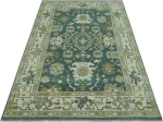 Angled studio shot showcasing the pattern uniformity of a bespoke hand-knotted carpet.